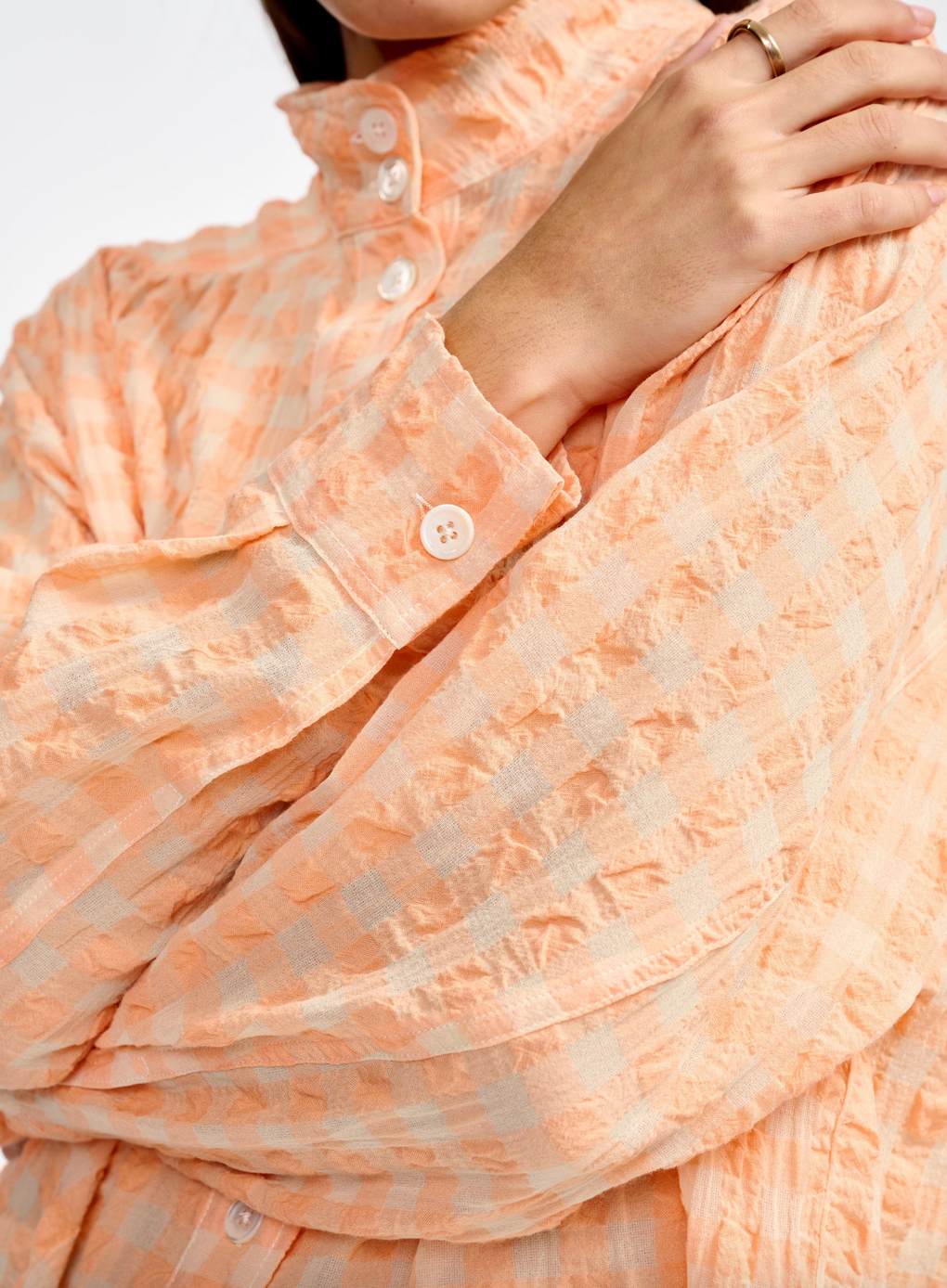 peachy blouse in check