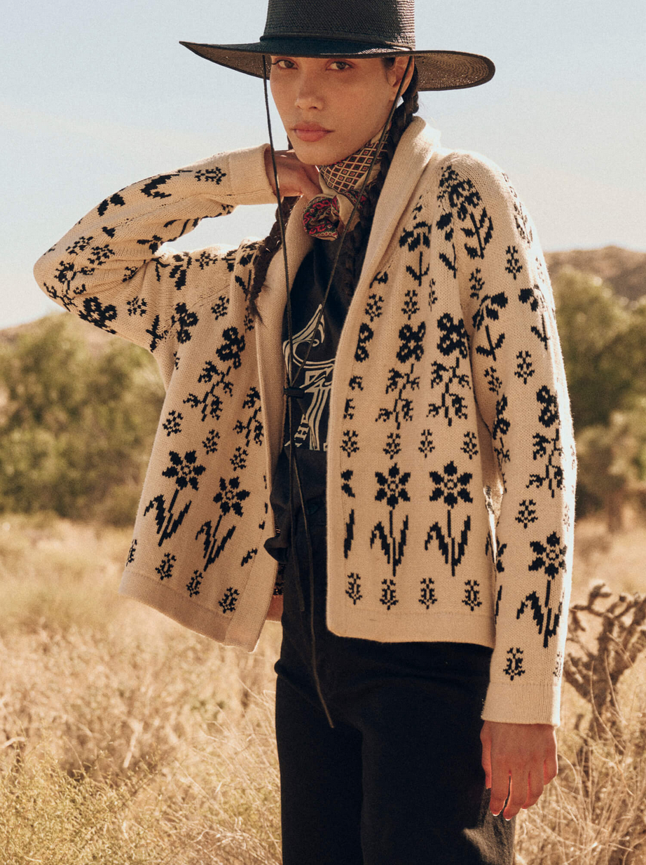 the garden lodge cardigan cream with black