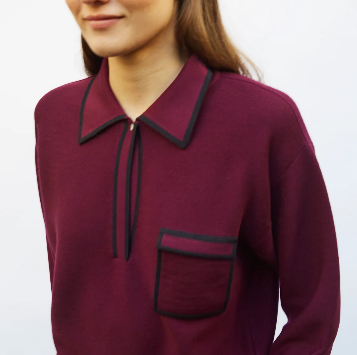 Slick knit shirt with band edged collar in prune nuit