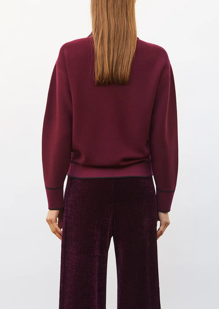 Slick knit shirt with band edged collar in prune nuit