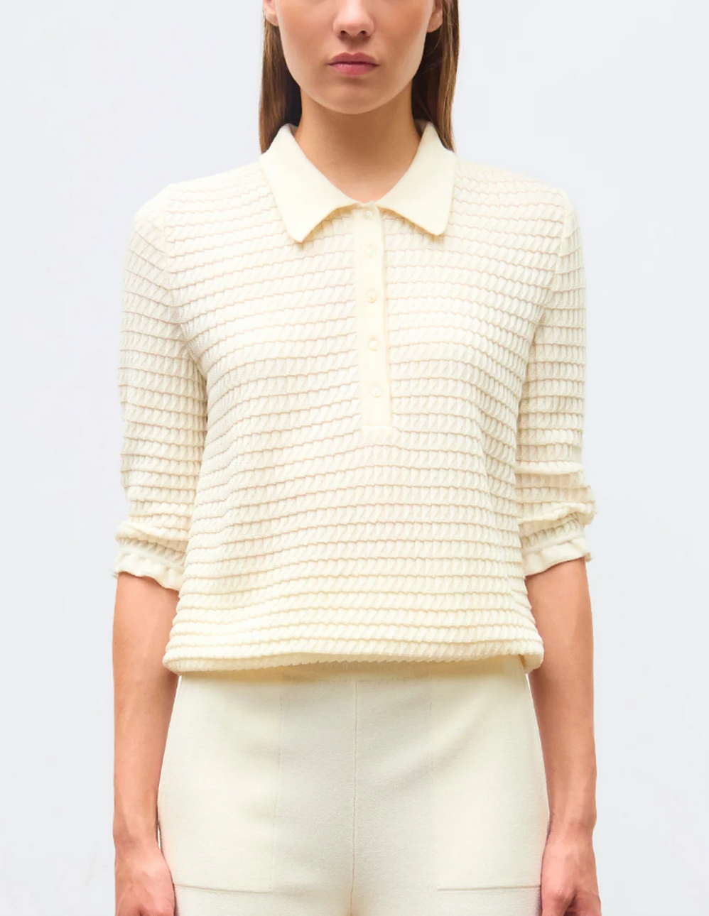 Cosmo polo in an origami knit natural