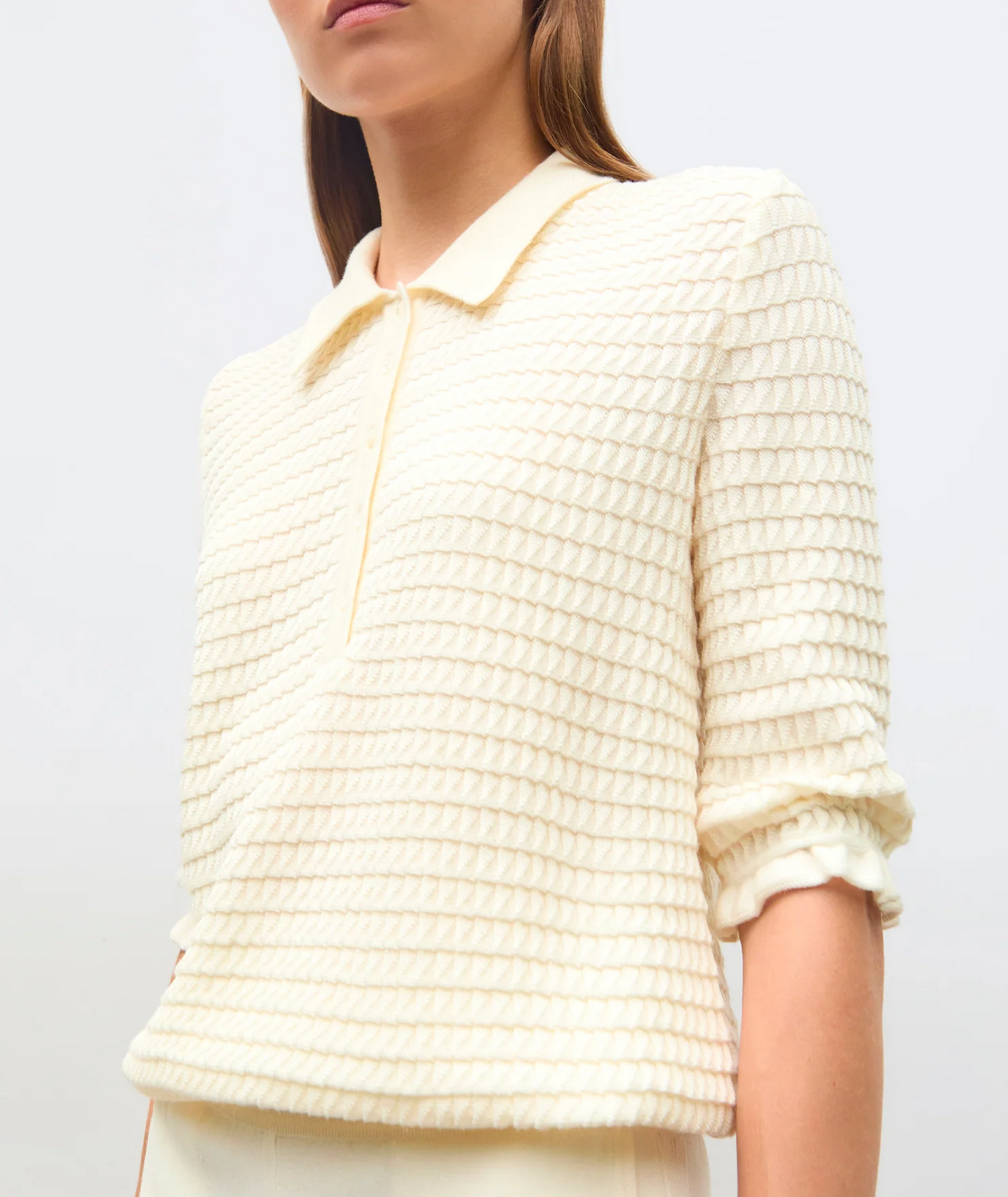 Cosmo polo in an origami knit natural