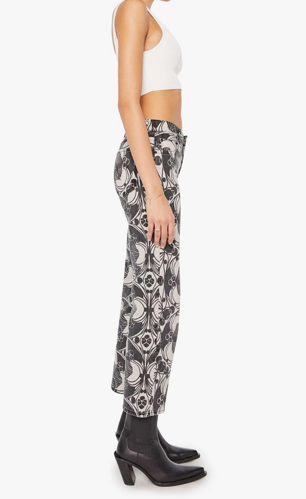 the mid rise rambler zip ankle curlycue black and cream