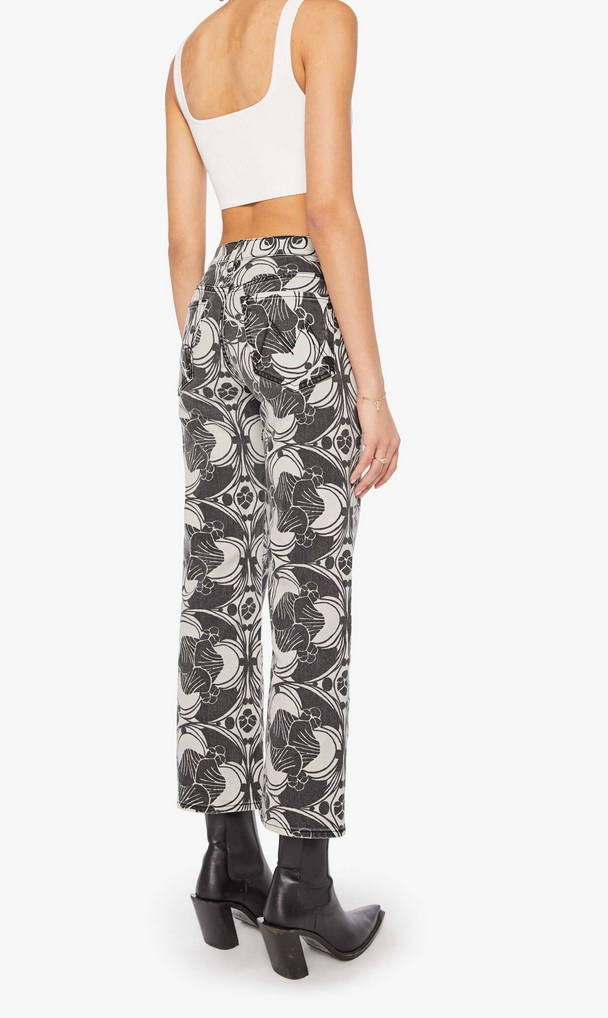the mid rise rambler zip ankle curlycue black and cream