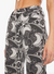 the mid rise rambler zip ankle curlycue black and cream