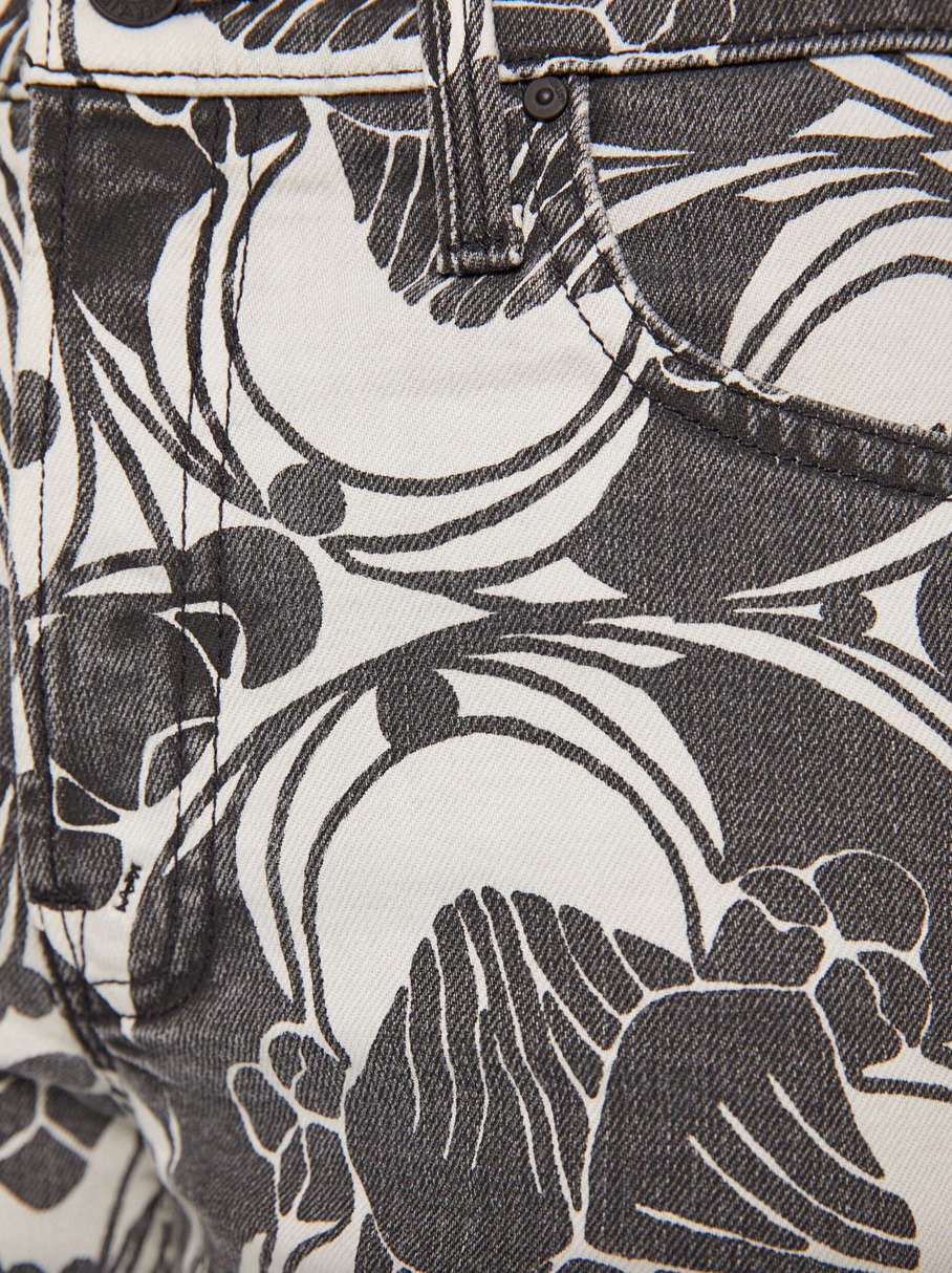 the mid rise rambler zip ankle curlycue black and cream