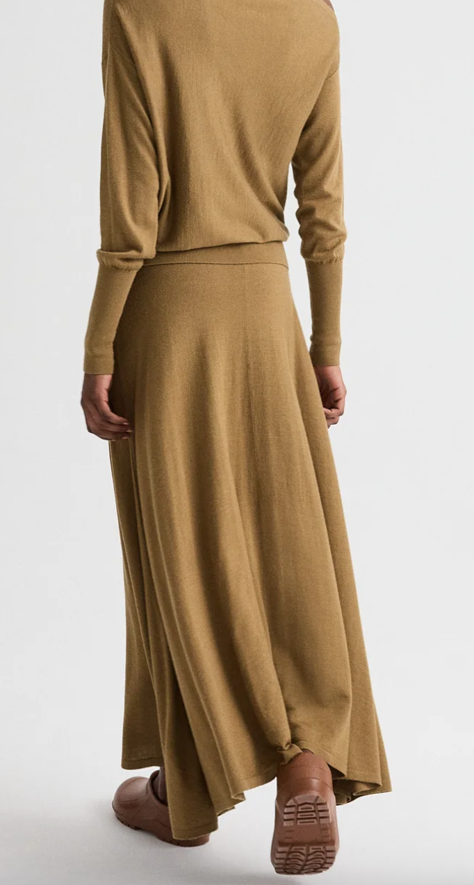 ermine hankercheif hem skirt with wide waistband in fine wool silk