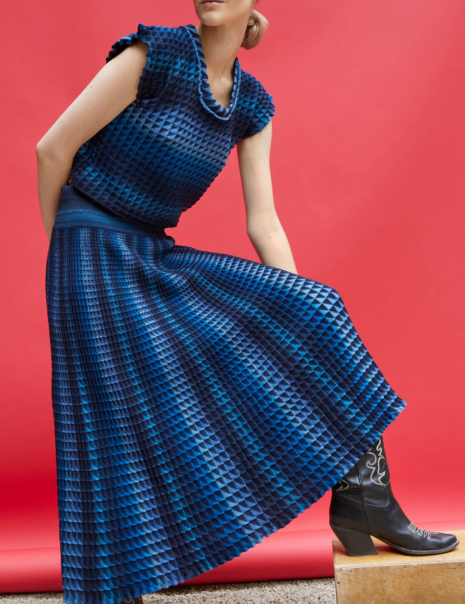 cocktail fluid skirt in an origami knit midnight-denim