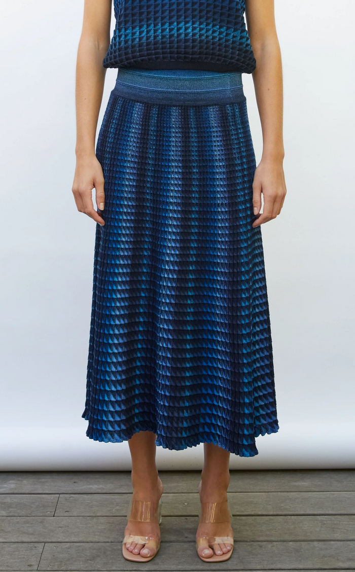 cocktail fluid skirt in an origami knit midnight-denim
