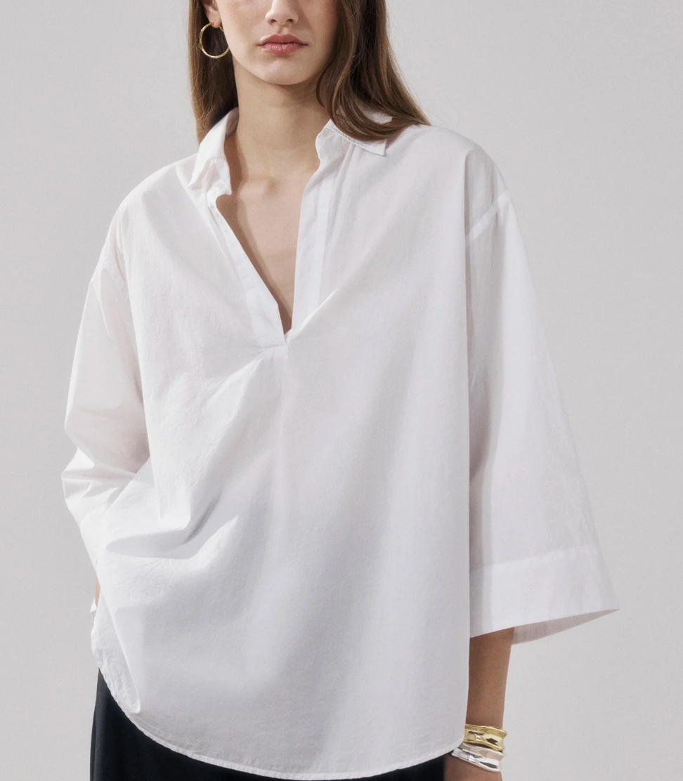 cola white polin shirt
