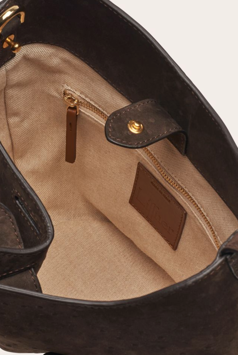 Belted bucket bag ostrich emboss