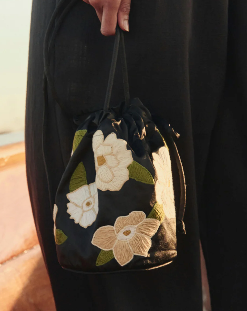 The embroidered cinched bucket bag black